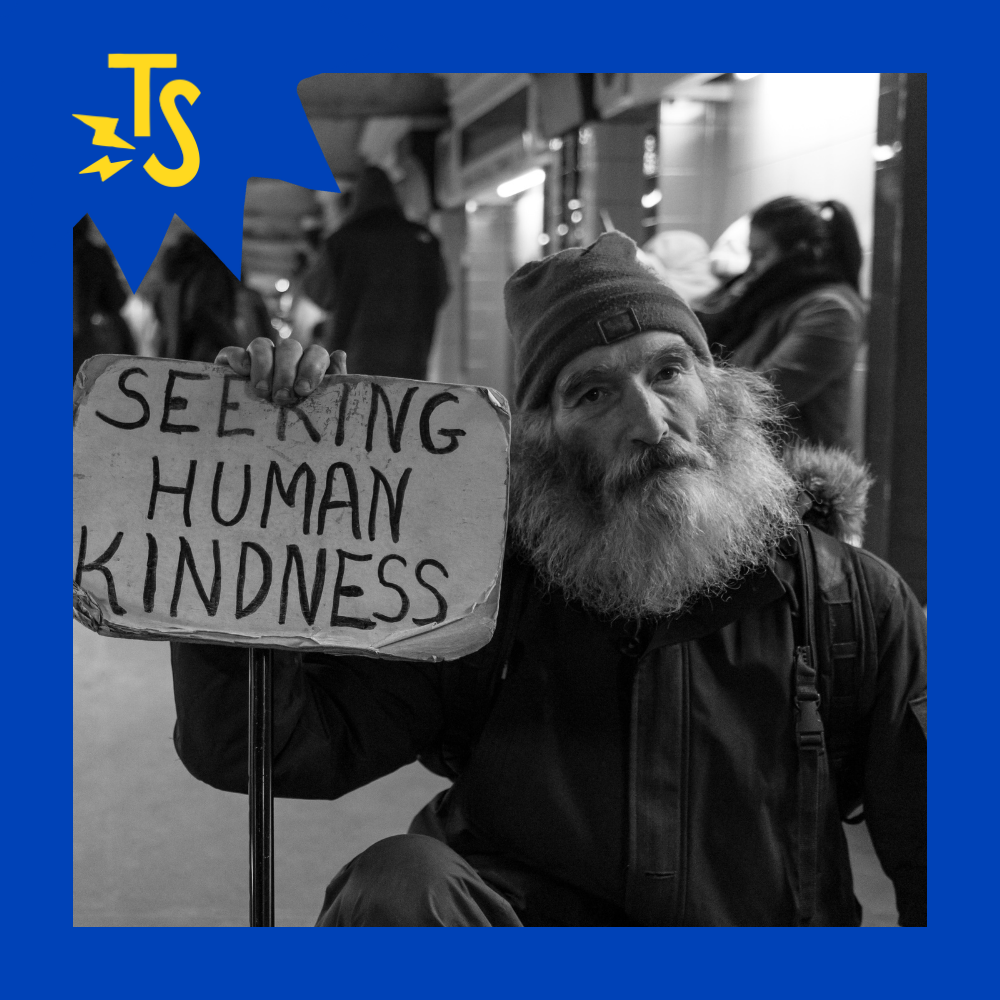 Maslow Blog Icon Image - Man holding a sign